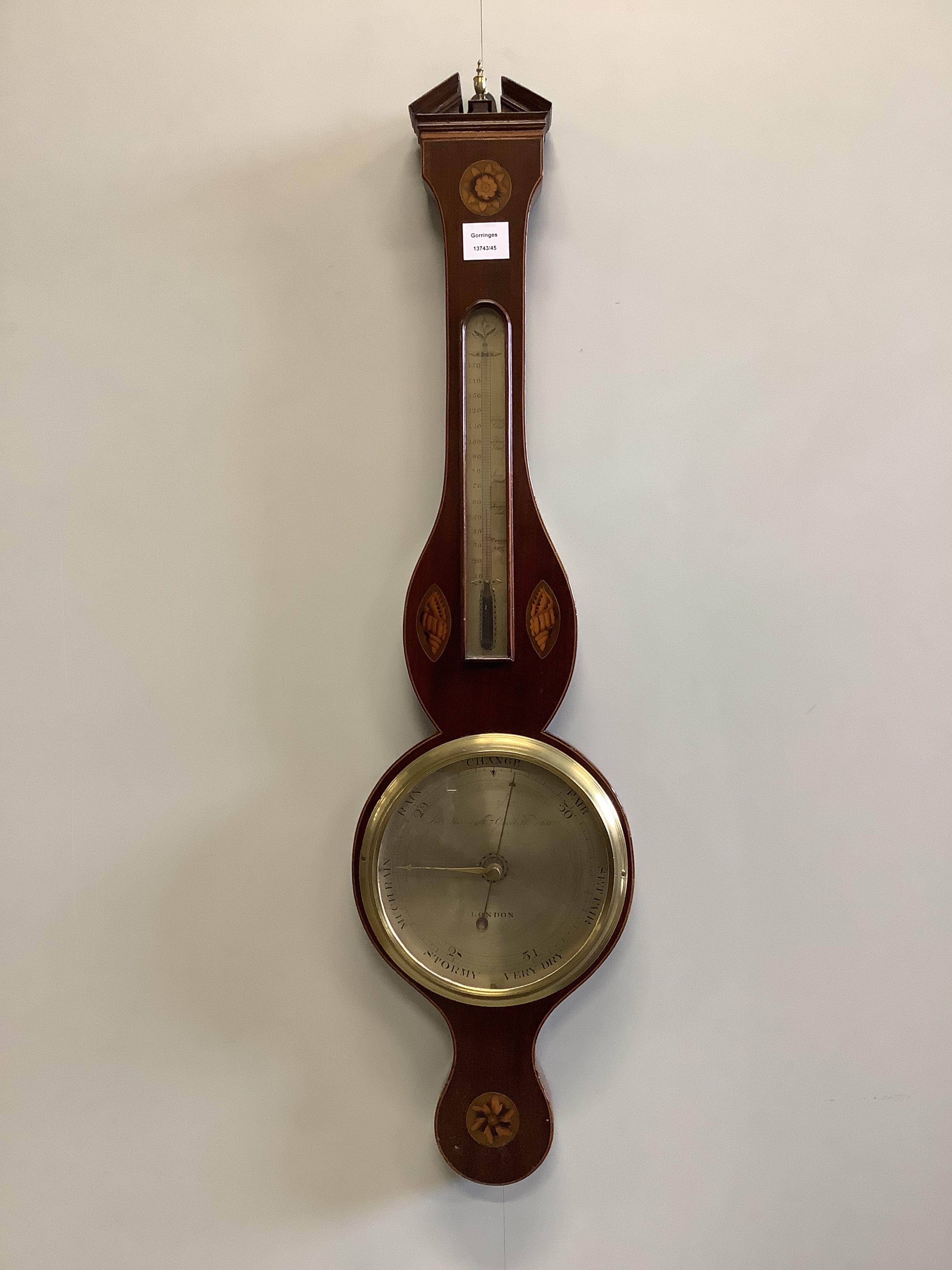 An early 19th century inlaid mahogany wheel barometer, height 100cm